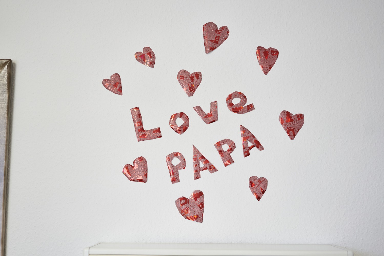 Gemaltes Bild zur Motivation mit der Botschaft "Love Papa"